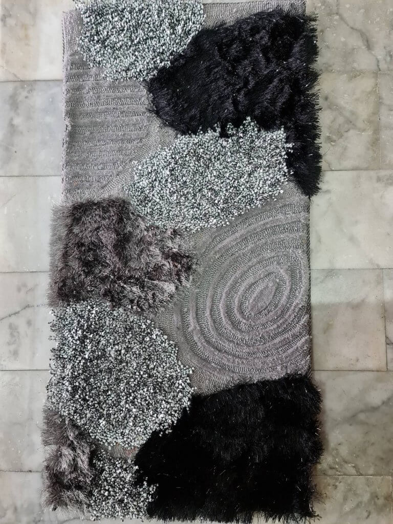 พรมขนาด50*100 cm.